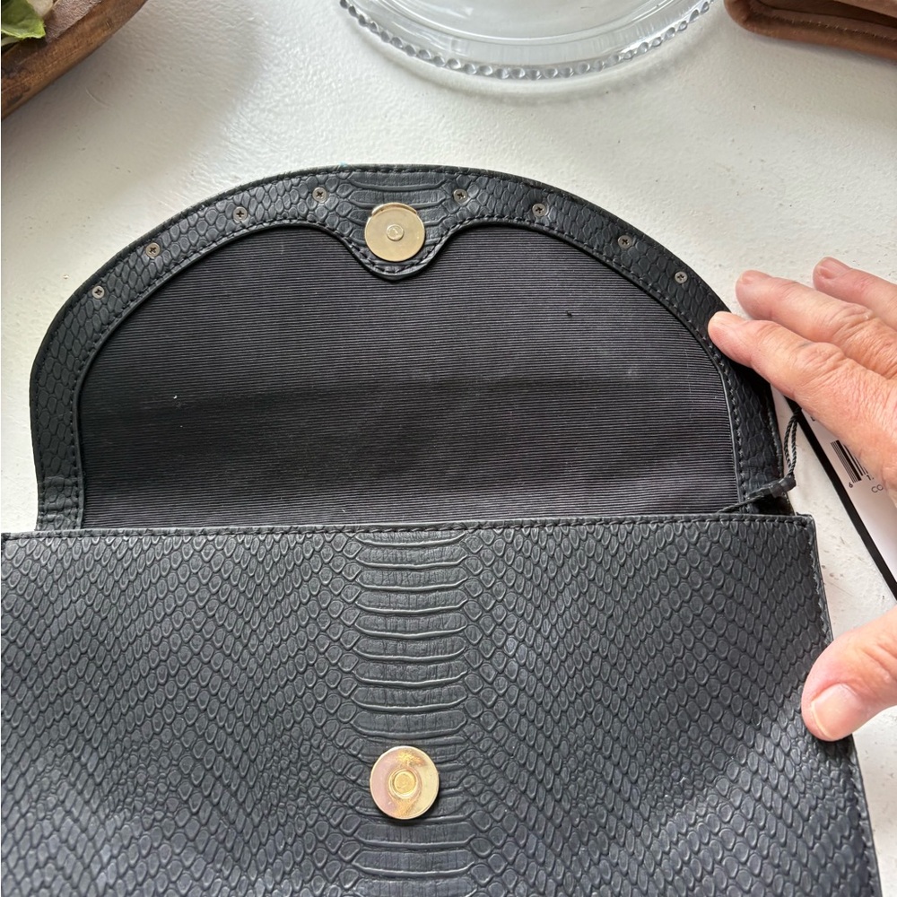 BCBGMAXAZRIA Black Clutch with Gold Accents. One stone missing on the front - Picture 5 of 7